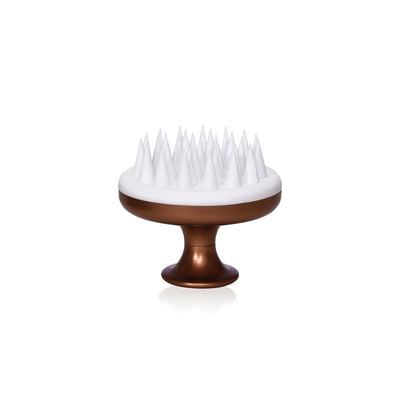 Scalp hairbrush with white bristles on a bronze colour base against a white background