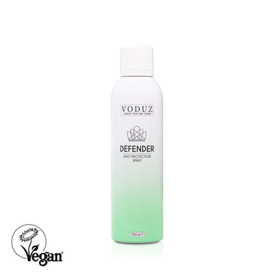 A can of VODUZ Defender Heat Protection Spray, 250ml, with a white and green label, designed for hair styling with Vegan Society Label.