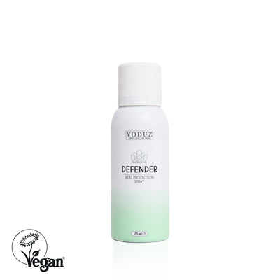 A can of Voduz Defender Heat Protection Spray 75ml, primarily in white and green color, with text and branding with Vegan Society Label.