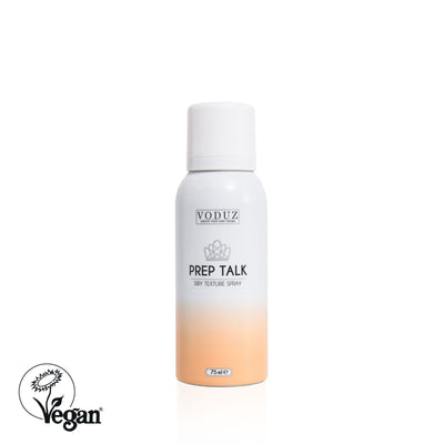 A can of 'Prep Talk' Dry Texture Spray by VODUZ with a white and peach color scheme against a white background with Vegan Society Label.